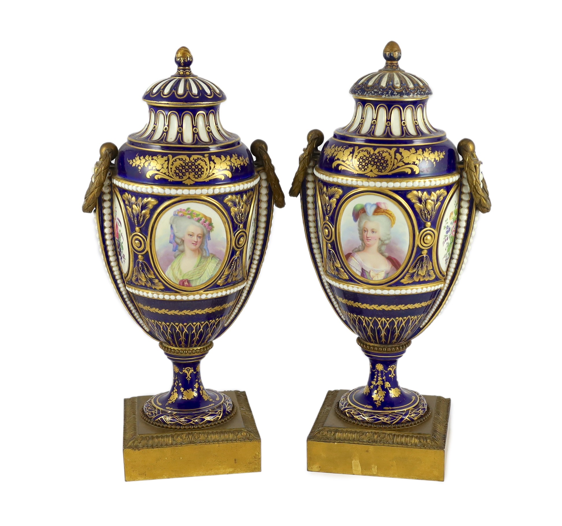 A pair of English porcelain Sevres style ormolu mounted vases and covers, mid 19th century, 44cm high, one replacement cover